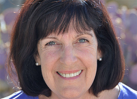 Ann Vanino, Coach - Headshot smiling outdoors